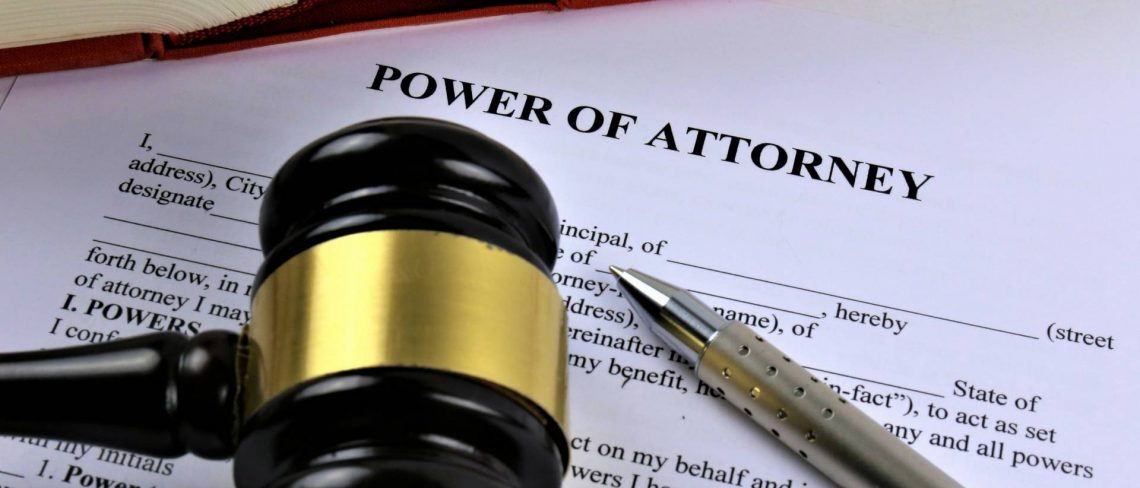 power of attorney lawyer - Power of Attorney document, pen and gavel