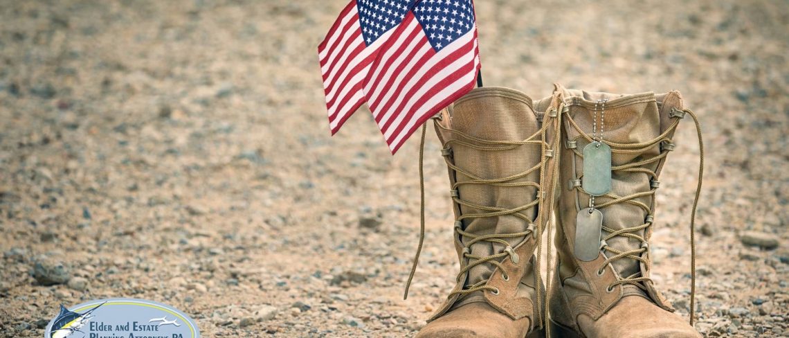 power of attorney lawyer - Army boots with two American flags and dog tags