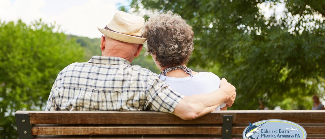 trust and estate attorneys in florida - Mature couple sitting on a bench